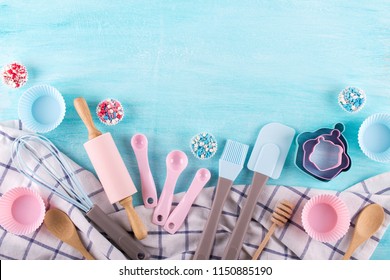 Various kitchen baking utensils. Flat lay. Top view, mockup for recipe on blue background. - Powered by Shutterstock