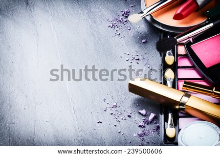 Various makeup products on dark background with copyspace Foto stock © 