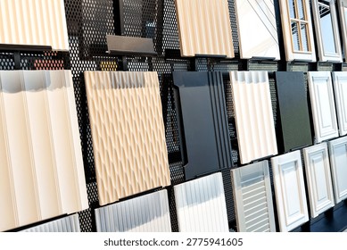 Various material samples displayed on a grid wall.