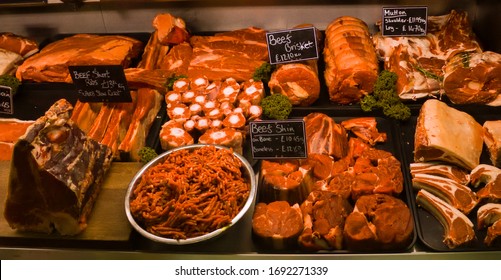 various-meat-cuts-exposed-butchery-fridge-stock-photo-1692271339