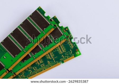 Various memory modules with green boards gold connectors, RAM modules technology.