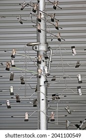 Various Metal Coat Hangers On A Metal Pole