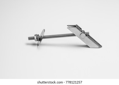 Various Metal Toggle Bolt On A White Background