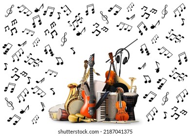various musical instruments white background There are various types musical notes   sizes around them  suitable for use in music  education   art advertising 