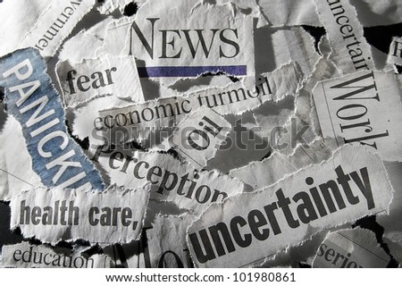 various newspaper headlines showing economic concepts