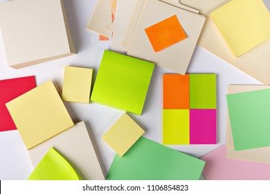 Various note papers spread over the desktop