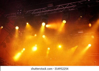 Various Orange Stage Lights In The Dark