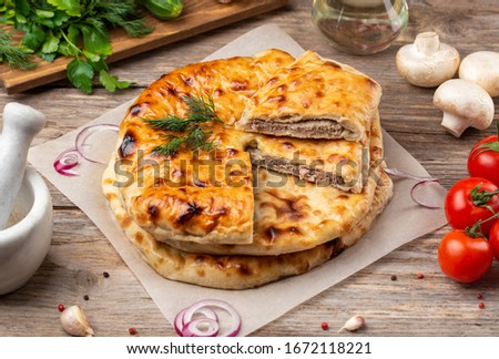 Various Ossetian pies on wooden background Stock photo © 