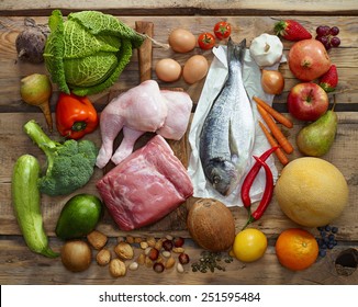 Various Paleo diet products on wooden table, top view - Shutterstock ID 251595484