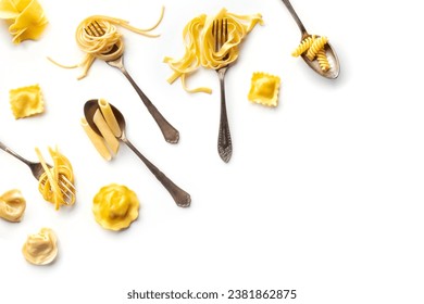 Various pasta forks. Spaghetti, fusilli, penne and other shapes of pasta, overhead flat lay shot on a white background. An assortment pasta types, with copy space - Powered by Shutterstock