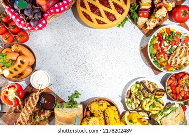 Various Picnic Barbeque Food And Drink Flatlay. Summer Bbq Picnic Food, Assorted Grilled Meats, Kebabs, Vegetable, Fruit Salad, Traditional Picnic Summer Pie Cake, Sandwiches, Top View Copy Space