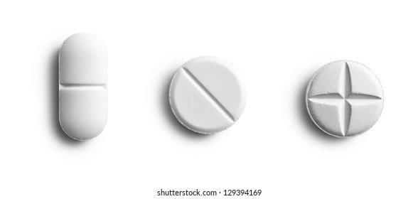the various pills on white background