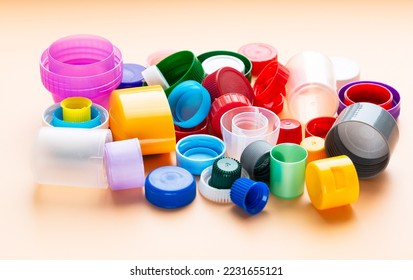 Various plastic bottle caps. Plastic processing. Reuse. Pollution of the environment - Shutterstock ID 2231655121