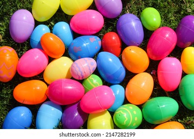 Various Plastic Easter Eggs On The Grass