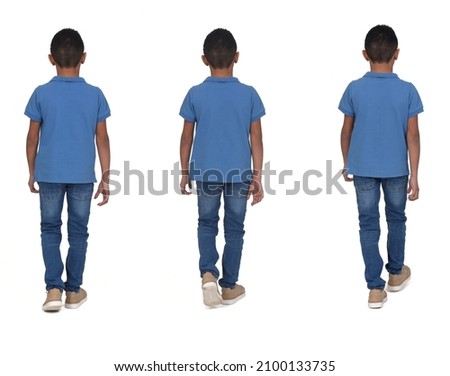 various poses of the same boy walking backwards
