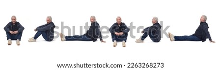 Similar – Image, Stock Photo An adult man sits cross-legged on a wooden pier on a lake in jeans and a jacket
