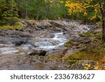 The various river features of the Amnicon River as it flows through Amnicon Falls State Park in Wisconsin.