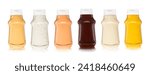 Various sauces in plastic bottles on white.Burger,garlic,mayo,barbecue and mustard sauce