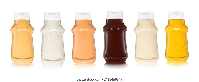 Various sauces in plastic bottles on white.Burger,garlic,mayo,barbecue and mustard sauce
