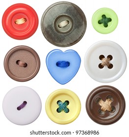 Various sewing buttons with a thread.