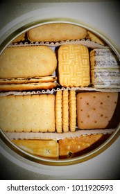 Various shapes and flavors of biscuits captured from top angle.