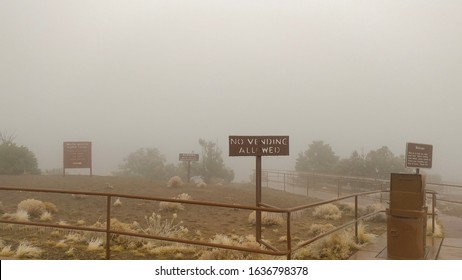 Various Signs At The Trailhead To The White House Ruins During Inclement Weather.