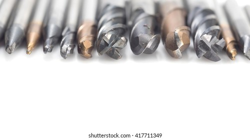 Various Size of broken cutting tools isolated on white background, used carbide Endmills and ballnose for machining center in metal work.