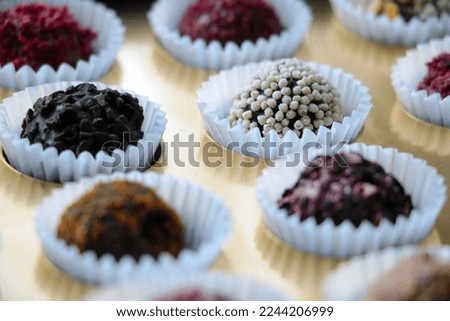Various small chocolates in a package or box