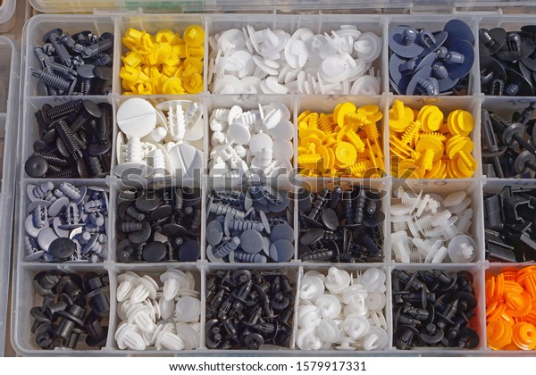 Various small\
plastic car parts for\
interior