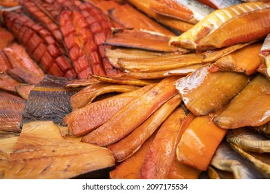 Various smoked fish products. Healthy eating and fish market concept