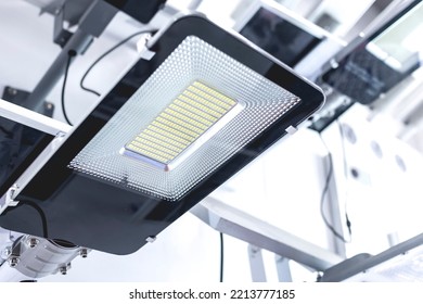 Various solar LED streetlights of different sizes and wattage on display at a light store.