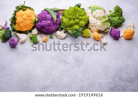 Various sort of cauliflower. Purple, yellow, white and green color cabbages. Broccoli and Romanesco