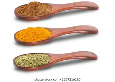 Various spices cinnamon,turmeric and oregano in the wooden spoon isolated on white background.With clipping path. - Powered by Shutterstock