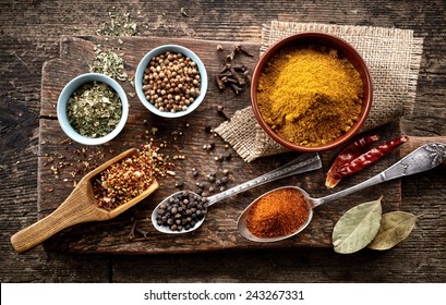 various spices on old wooden table - Powered by Shutterstock