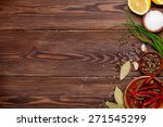 Various spices on wooden background. Top view with copy space 