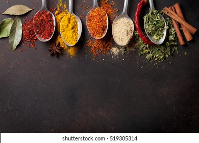 Various spices spoons on stone table. Top view with copy space - Powered by Shutterstock