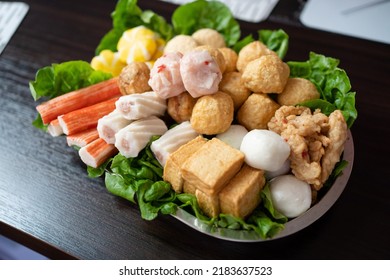 Various Steamboat Ready To Cook Ingredient That Include Fish Ball, Tofu, Squid Ball, Fish Cakes And Vegetables
