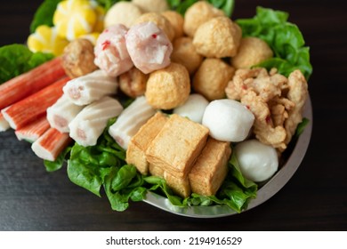 Various Steamboat Ready To Cook Ingredient That Include Fish Ball, Tofu, Squid Ball, Fish Cakes And Vegetables
