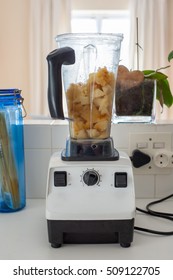 Various Steps Of A Home Cook Making Apple Sauce In A Blender