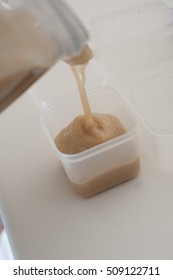 Various Steps Of A Home Cook Making Apple Sauce In A Blender