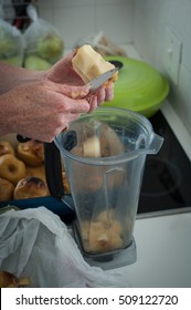 Various Steps Of A Home Cook Making Apple Sauce In A Blender