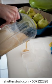 Various Steps Of A Home Cook Making Apple Sauce In A Blender