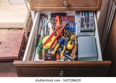 Various tools in the drawer in the workshop