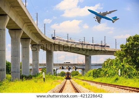 Various transportation (including diesel locomotive and electric sky train and car and airplane), Bangkok, Thailand