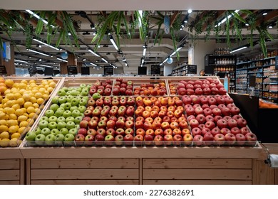 Various type of fresh fruits arrange neatly grocery store. Apple, Orange, Pomegranate, Lemon on rack.  - Shutterstock ID 2276382691