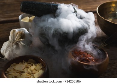 Various type of spices in bowl on wooden table - Powered by Shutterstock