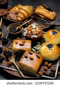 Various Types Of Bakery And Bakery Equipment  Put Together On A Wooden Table