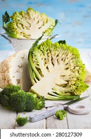 Various types of cabbage: romanesco, broccoli and cauliflower cabbage. Whole and cut in half