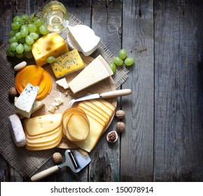 Various types of cheese with empty space background concept - Powered by Shutterstock