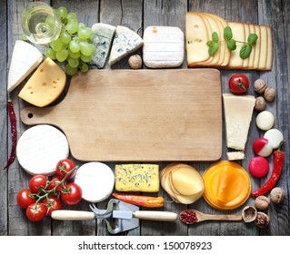 Various types of cheese with empty space background concept - Powered by Shutterstock